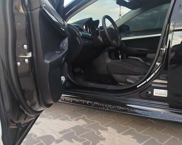 Чорний Міцубісі Lancer, об'ємом двигуна 2 л та пробігом 286 тис. км за 7950 $, фото 7 на Automoto.ua