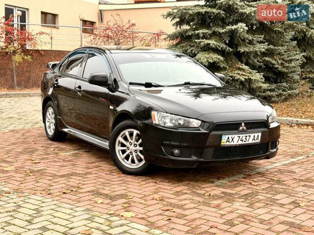Черный Мицубиси Лансер, объемом двигателя 2 л и пробегом 169 тыс. км за 6800 $, фото 18 на Automoto.ua