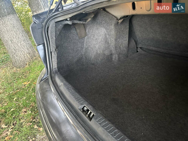 Черный Мицубиси Лансер, объемом двигателя 1.5 л и пробегом 202 тыс. км за 6500 $, фото 47 на Automoto.ua