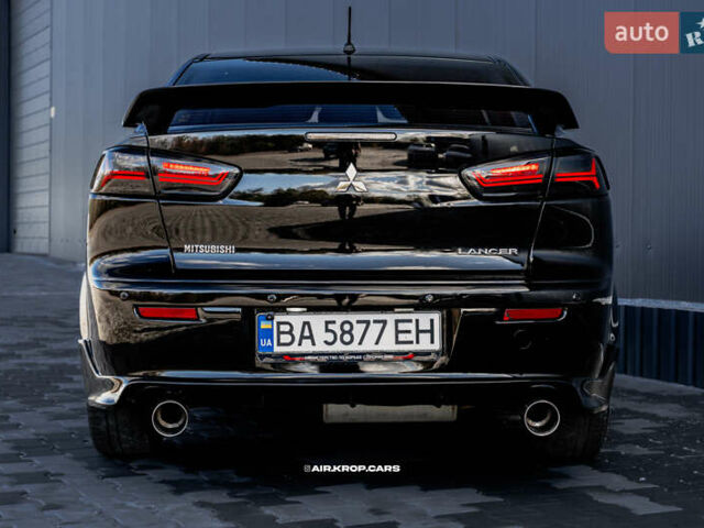 Чорний Міцубісі Lancer, об'ємом двигуна 2 л та пробігом 204 тис. км за 9500 $, фото 23 на Automoto.ua