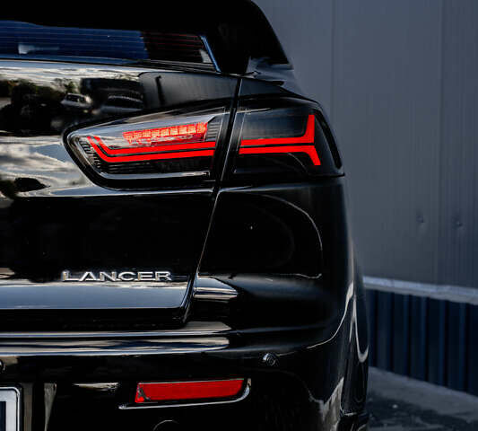 Чорний Міцубісі Lancer, об'ємом двигуна 2 л та пробігом 204 тис. км за 9500 $, фото 26 на Automoto.ua
