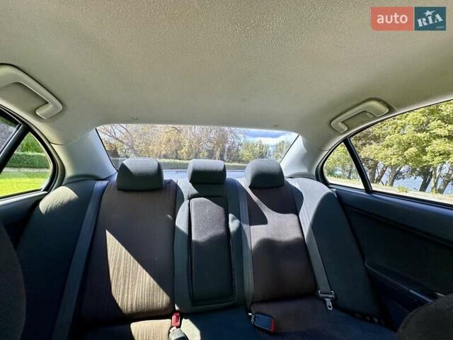 Чорний Міцубісі Lancer, об'ємом двигуна 1.5 л та пробігом 187 тис. км за 6800 $, фото 17 на Automoto.ua