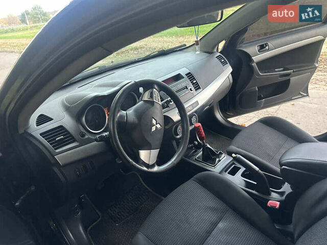 Черный Мицубиси Лансер, объемом двигателя 1.5 л и пробегом 202 тыс. км за 6500 $, фото 35 на Automoto.ua