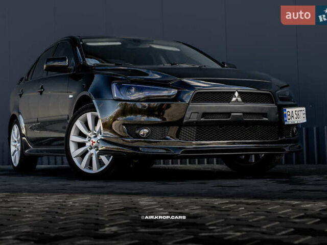 Чорний Міцубісі Lancer, об'ємом двигуна 2 л та пробігом 204 тис. км за 9500 $, фото 12 на Automoto.ua