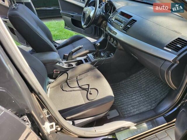 Чорний Міцубісі Lancer, об'ємом двигуна 1.5 л та пробігом 185 тис. км за 7300 $, фото 8 на Automoto.ua