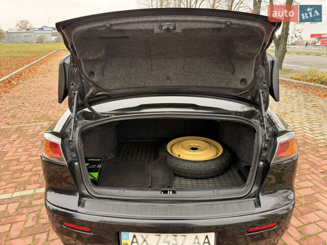 Черный Мицубиси Лансер, объемом двигателя 2 л и пробегом 169 тыс. км за 6800 $, фото 35 на Automoto.ua