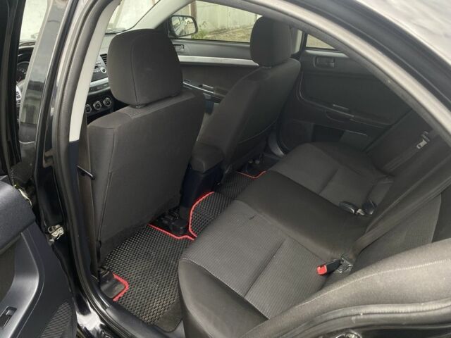 Міцубісі Lancer 2011 у Полтаві на Automoto.ua Чорний Міцубісі Lancer, об'ємом двигуна 1.5 л та пробігом 240 тис. км за 6300 $, фото 4 на Automoto.ua