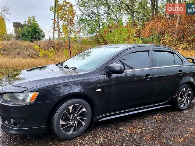 Чорний Міцубісі Lancer, об'ємом двигуна 1.5 л та пробігом 197 тис. км за 7500 $, фото 2 на Automoto.ua