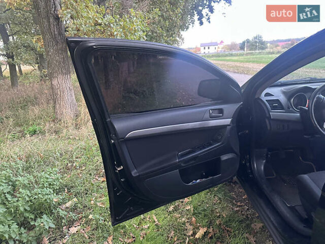 Черный Мицубиси Лансер, объемом двигателя 1.5 л и пробегом 202 тыс. км за 6500 $, фото 23 на Automoto.ua