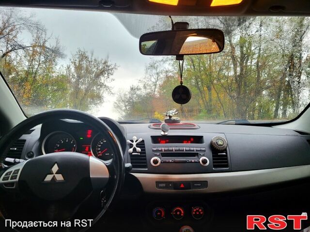 Чорний Міцубісі Lancer, об'ємом двигуна 1.5 л та пробігом 197 тис. км за 7500 $, фото 4 на Automoto.ua