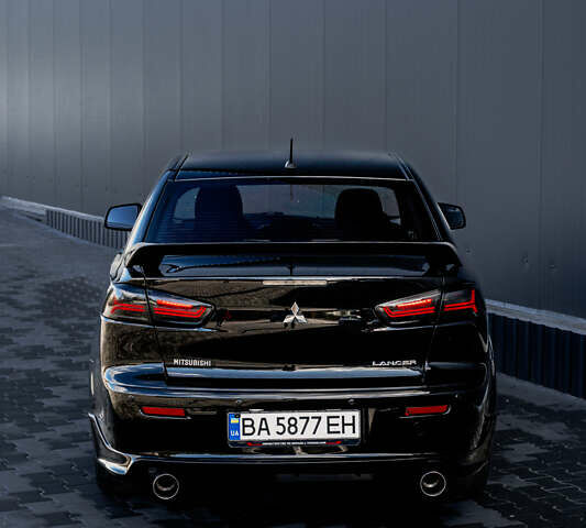 Чорний Міцубісі Lancer, об'ємом двигуна 2 л та пробігом 204 тис. км за 9500 $, фото 22 на Automoto.ua