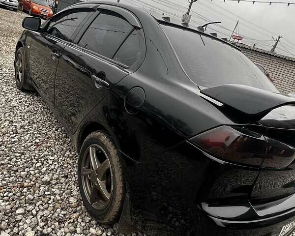 Черный Мицубиси Лансер, объемом двигателя 1.5 л и пробегом 250 тыс. км за 4800 $, фото 5 на Automoto.ua