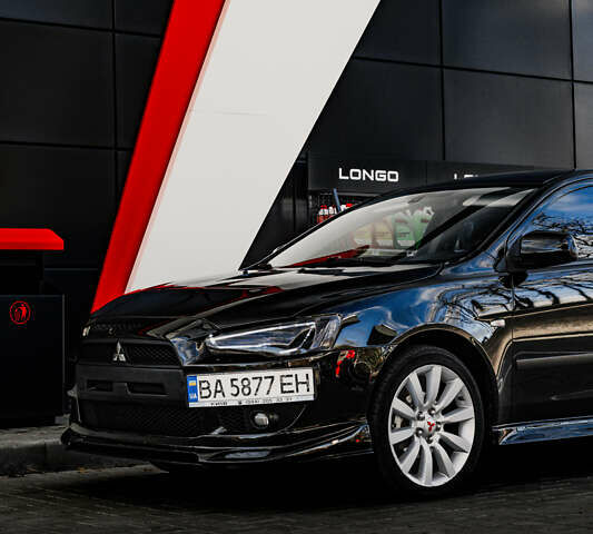 Чорний Міцубісі Lancer, об'ємом двигуна 2 л та пробігом 204 тис. км за 9500 $, фото 52 на Automoto.ua