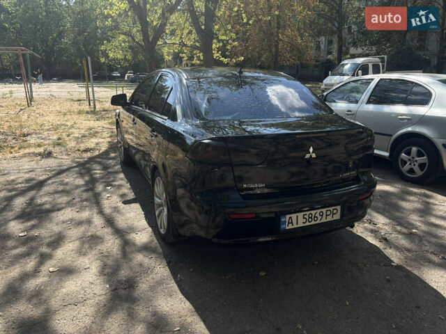 Черный Мицубиси Лансер, объемом двигателя 1.5 л и пробегом 167 тыс. км за 6800 $, фото 3 на Automoto.ua