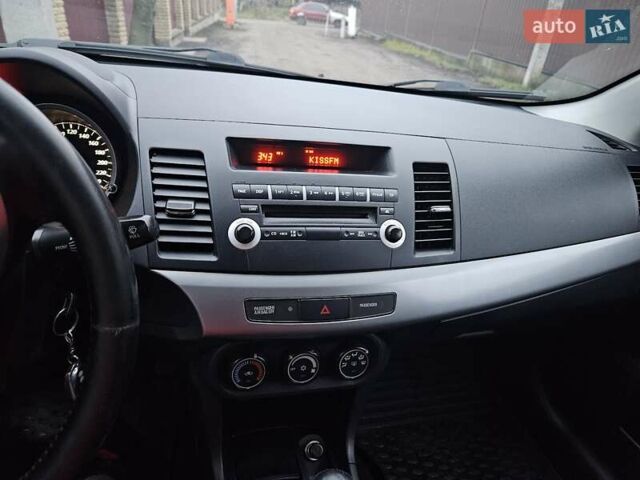 Черный Мицубиси Лансер, объемом двигателя 1.5 л и пробегом 222 тыс. км за 4900 $, фото 28 на Automoto.ua