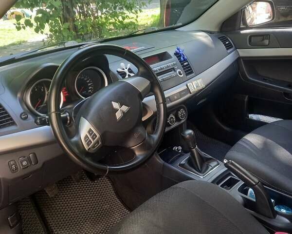 Мицубиси Лансер 2011 в Кропивницком (Кировограде) на Automoto.ua Черный Мицубиси Лансер, объемом двигателя 1.5 л и пробегом 150 тыс. км за 7000 $, фото 1 на Automoto.ua