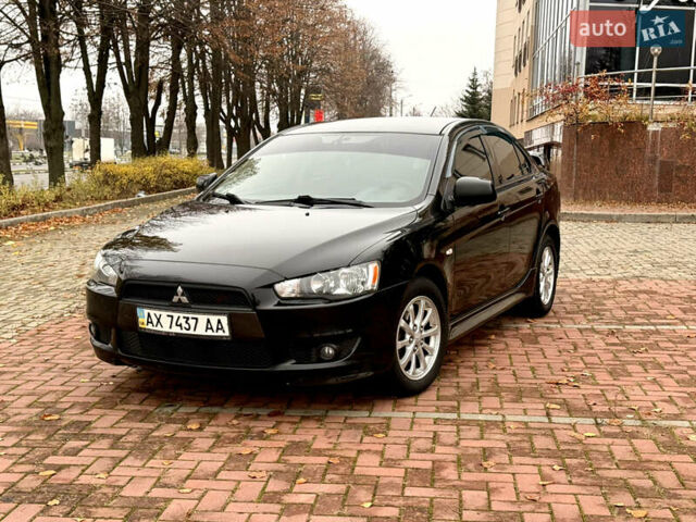 Черный Мицубиси Лансер, объемом двигателя 2 л и пробегом 169 тыс. км за 6800 $, фото 8 на Automoto.ua