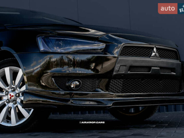 Чорний Міцубісі Lancer, об'ємом двигуна 2 л та пробігом 204 тис. км за 9500 $, фото 10 на Automoto.ua