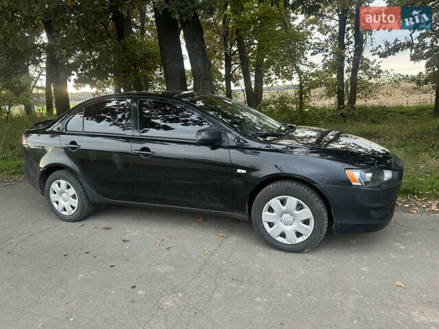 Черный Мицубиси Лансер, объемом двигателя 1.5 л и пробегом 202 тыс. км за 6500 $, фото 3 на Automoto.ua