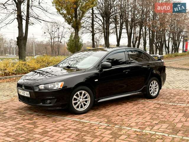 Черный Мицубиси Лансер, объемом двигателя 2 л и пробегом 169 тыс. км за 6800 $, фото 10 на Automoto.ua
