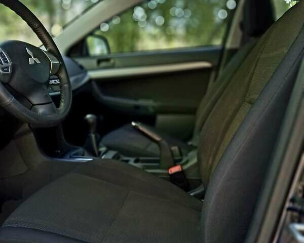 Чорний Міцубісі Lancer, об'ємом двигуна 1.5 л та пробігом 90 тис. км за 7699 $, фото 7 на Automoto.ua