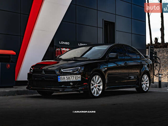Чорний Міцубісі Lancer, об'ємом двигуна 2 л та пробігом 204 тис. км за 9500 $, фото 51 на Automoto.ua