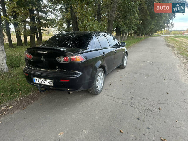 Черный Мицубиси Лансер, объемом двигателя 1.5 л и пробегом 202 тыс. км за 6500 $, фото 5 на Automoto.ua