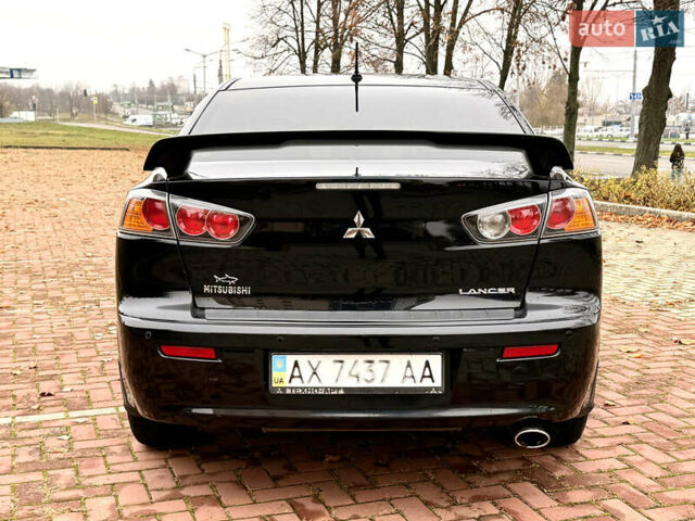 Черный Мицубиси Лансер, объемом двигателя 2 л и пробегом 169 тыс. км за 6800 $, фото 7 на Automoto.ua