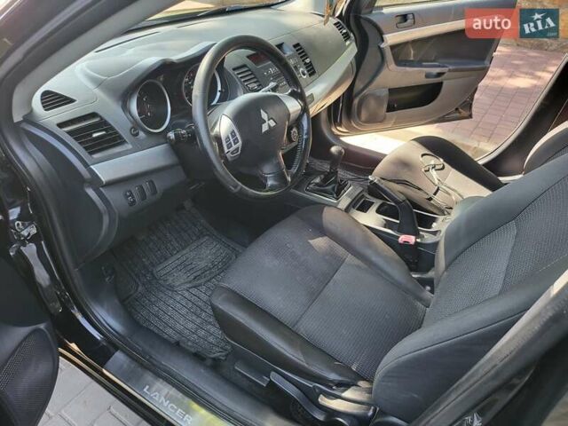 Чорний Міцубісі Lancer, об'ємом двигуна 1.5 л та пробігом 185 тис. км за 7300 $, фото 11 на Automoto.ua
