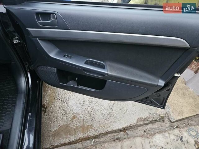 Черный Мицубиси Лансер, объемом двигателя 1.5 л и пробегом 222 тыс. км за 4900 $, фото 13 на Automoto.ua