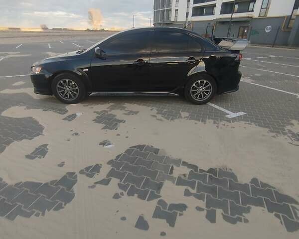 Чорний Міцубісі Lancer, об'ємом двигуна 2 л та пробігом 286 тис. км за 7950 $, фото 12 на Automoto.ua
