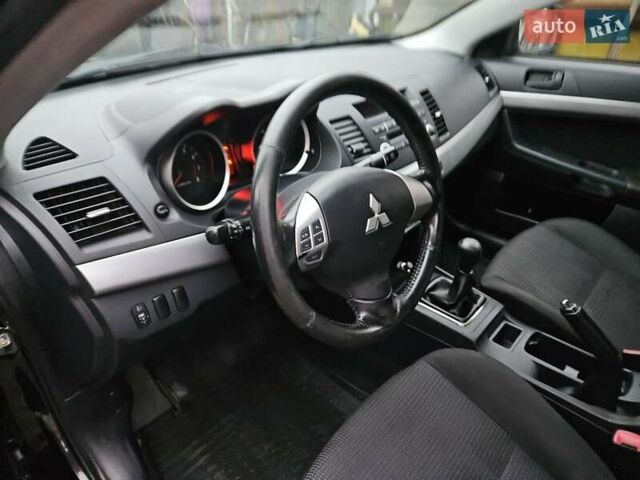 Черный Мицубиси Лансер, объемом двигателя 1.5 л и пробегом 222 тыс. км за 4900 $, фото 21 на Automoto.ua