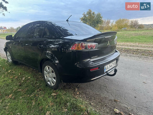 Черный Мицубиси Лансер, объемом двигателя 1.5 л и пробегом 202 тыс. км за 6500 $, фото 14 на Automoto.ua