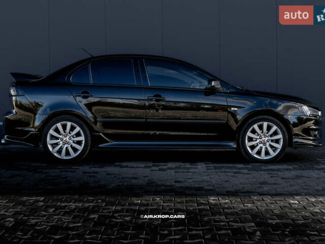 Чорний Міцубісі Lancer, об'ємом двигуна 2 л та пробігом 204 тис. км за 9500 $, фото 4 на Automoto.ua