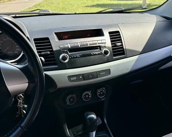 Чорний Міцубісі Lancer, об'ємом двигуна 1.5 л та пробігом 187 тис. км за 6800 $, фото 12 на Automoto.ua