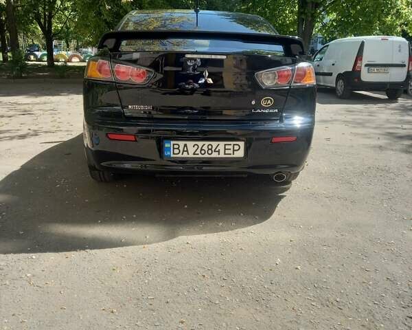 Мицубиси Лансер 2011 в Кропивницком (Кировограде) на Automoto.ua Черный Мицубиси Лансер, объемом двигателя 1.5 л и пробегом 150 тыс. км за 7000 $, фото 7 на Automoto.ua