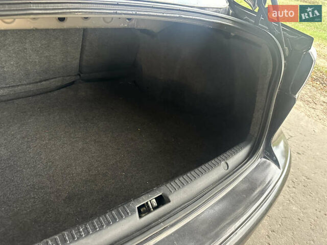 Черный Мицубиси Лансер, объемом двигателя 1.5 л и пробегом 202 тыс. км за 6500 $, фото 46 на Automoto.ua