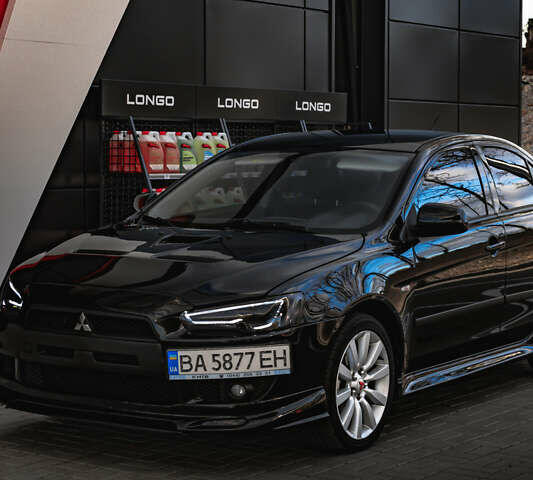 Чорний Міцубісі Lancer, об'ємом двигуна 2 л та пробігом 204 тис. км за 9500 $, фото 50 на Automoto.ua
