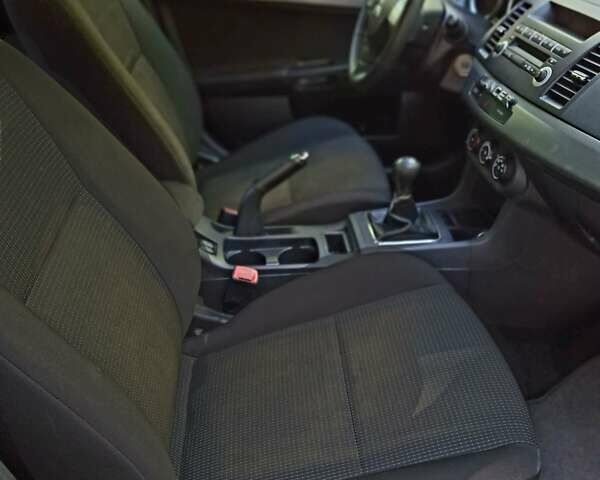 Чорний Міцубісі Lancer, об'ємом двигуна 1.5 л та пробігом 90 тис. км за 7699 $, фото 8 на Automoto.ua