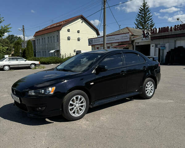 Черный Мицубиси Лансер, объемом двигателя 1.5 л и пробегом 230 тыс. км за 5400 $, фото 1 на Automoto.ua