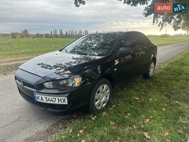 Черный Мицубиси Лансер, объемом двигателя 1.5 л и пробегом 202 тыс. км за 6500 $, фото 7 на Automoto.ua