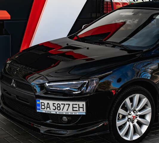 Чорний Міцубісі Lancer, об'ємом двигуна 2 л та пробігом 204 тис. км за 9500 $, фото 54 на Automoto.ua