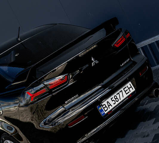 Чорний Міцубісі Lancer, об'ємом двигуна 2 л та пробігом 204 тис. км за 9500 $, фото 21 на Automoto.ua