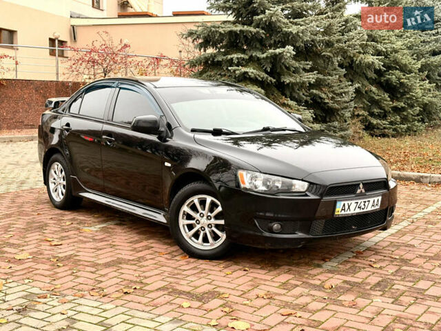 Черный Мицубиси Лансер, объемом двигателя 2 л и пробегом 169 тыс. км за 6800 $, фото 19 на Automoto.ua