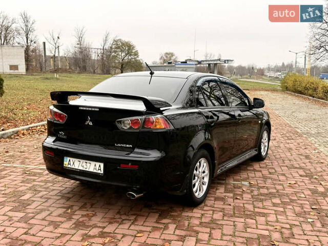 Черный Мицубиси Лансер, объемом двигателя 2 л и пробегом 169 тыс. км за 6800 $, фото 22 на Automoto.ua