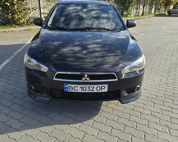 Черный Мицубиси Лансер, объемом двигателя 1.8 л и пробегом 207 тыс. км за 7950 $, фото 5 на Automoto.ua