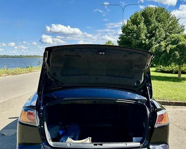 Чорний Міцубісі Lancer, об'ємом двигуна 1.5 л та пробігом 187 тис. км за 6800 $, фото 8 на Automoto.ua