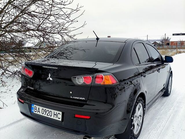 Чорний Міцубісі Lancer, об'ємом двигуна 1.5 л та пробігом 128 тис. км за 8000 $, фото 4 на Automoto.ua