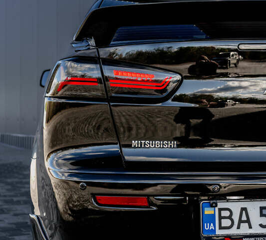 Чорний Міцубісі Lancer, об'ємом двигуна 2 л та пробігом 204 тис. км за 9500 $, фото 25 на Automoto.ua