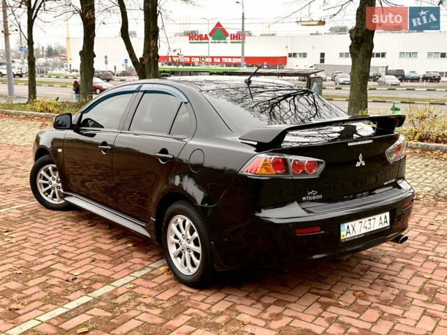 Черный Мицубиси Лансер, объемом двигателя 2 л и пробегом 169 тыс. км за 6800 $, фото 17 на Automoto.ua